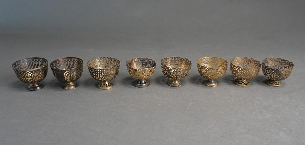 Appraisal: EIGHT ASSORTED LIKELY OTTOMAN PARTIALLY GILT RETICULATED ZARF CUPS COMBINED