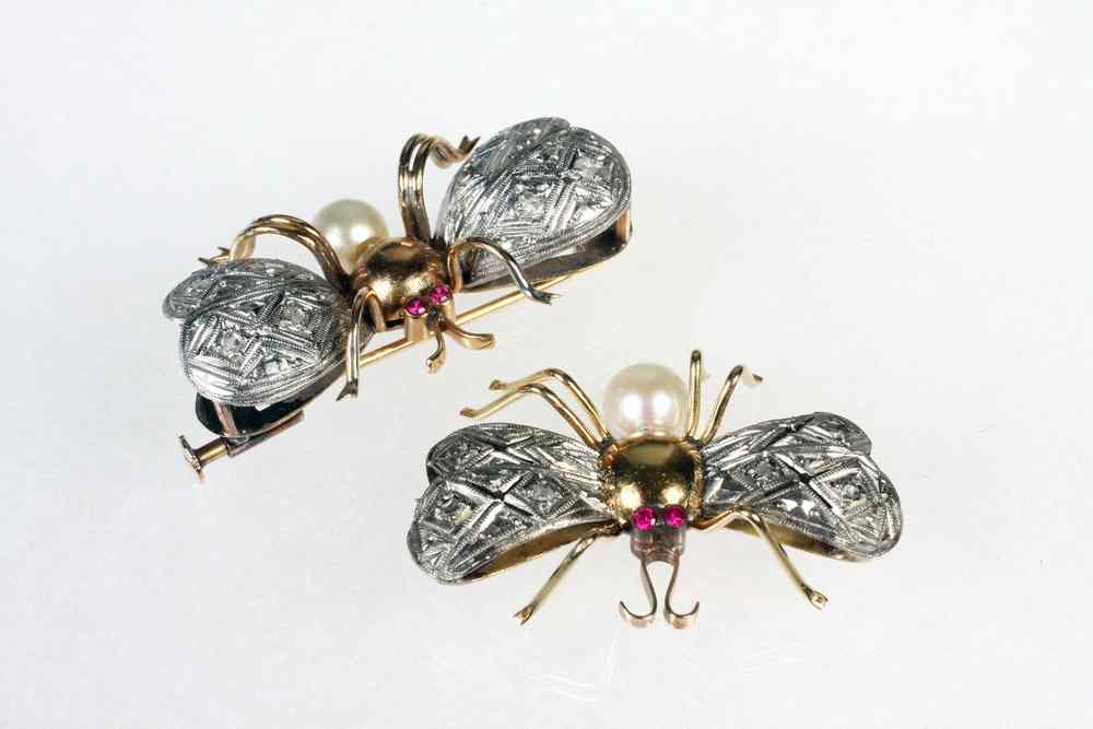 Appraisal: BROOCHES - Pair of vintage flying insect form K rose