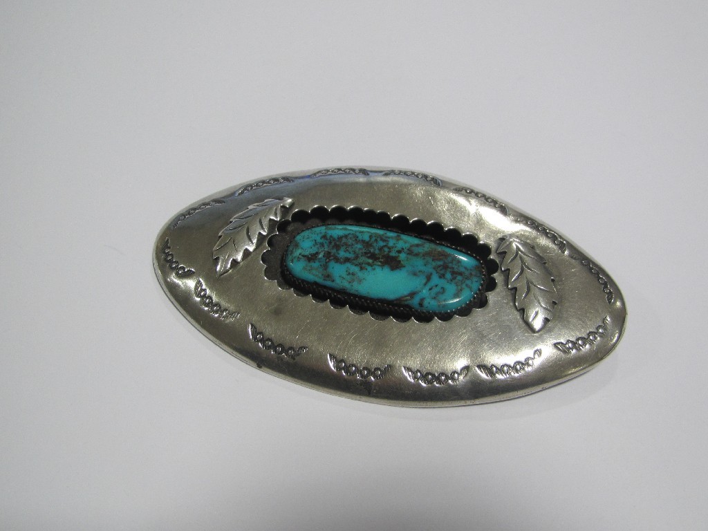 Appraisal: American Indian oval shaped brooch with central turquoise inset x