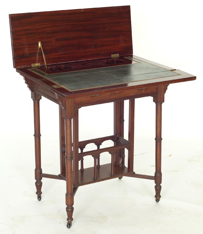 Appraisal: EDWARDIAN INLAID MAHOGANY LADY'S FOLD-OVER WRITING TABLE the rectangular string-inlaid