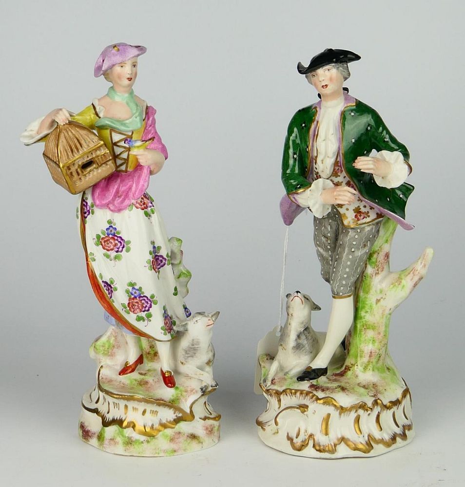 Appraisal: PAIR OF ANTIQUE FRENCH PERIOD PORCELAIN FIGURINES Each stands about