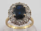 Appraisal: A yellow metal tests carat gold sapphire and diamond ring