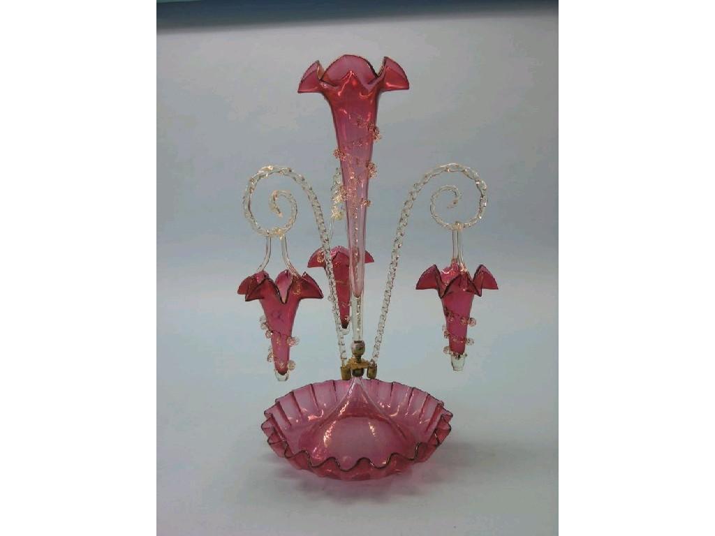 Appraisal: A Victorian cranberry glass epergne central vase and three pendant