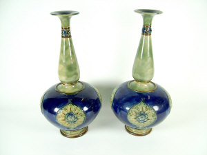 Appraisal: Pair of Royal Doulton vases of stylised bottle form with