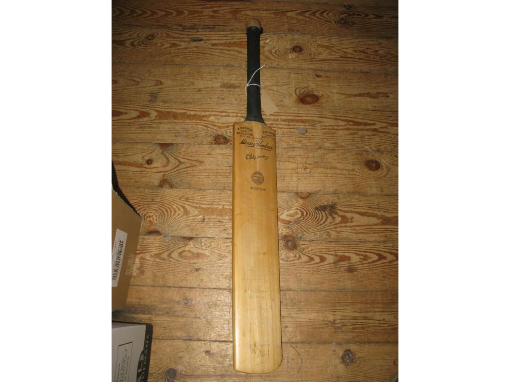 Appraisal: An autographed cricket bat signed by the players of England