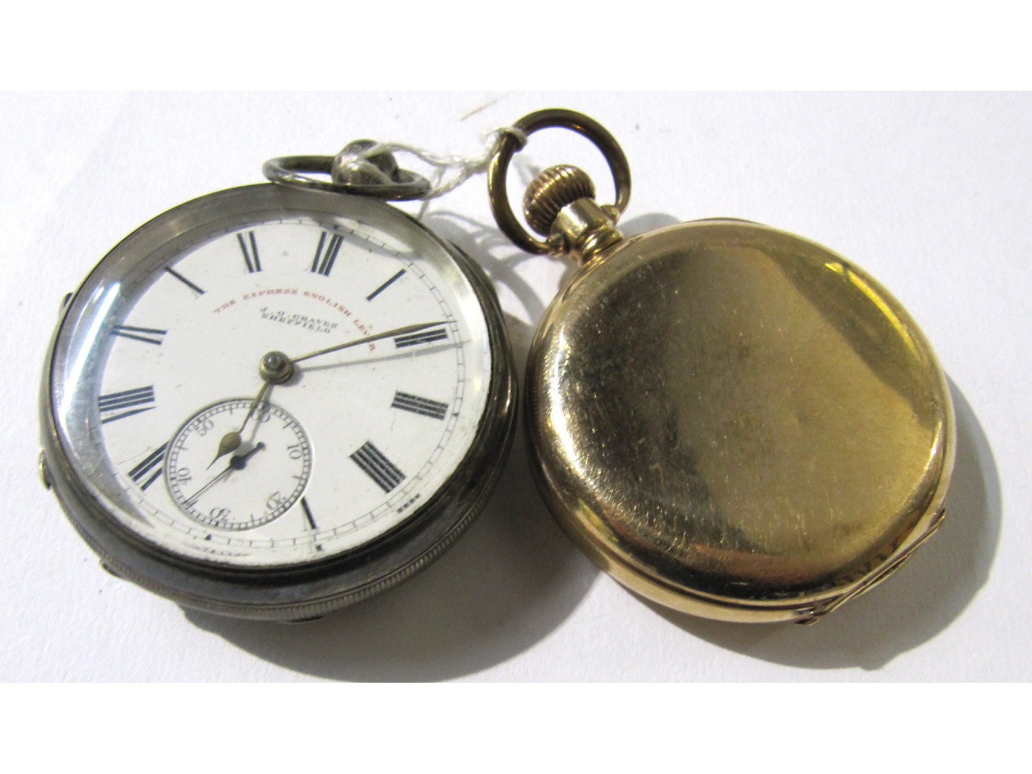 Appraisal: A lot comprising a silver pocket watch and a rolled