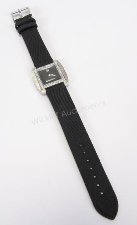 Appraisal: A K white gold lady's diamond Longines watch with black