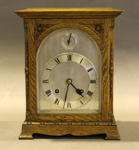 Appraisal: A French Art Deco mantle clock and Tazza garniture by