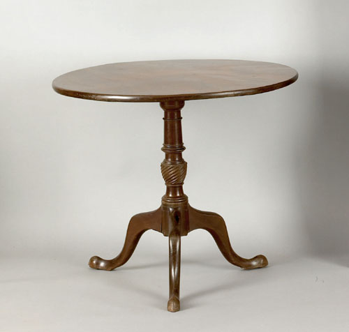 Appraisal: George II mahogany tea table ca the circular top tilting