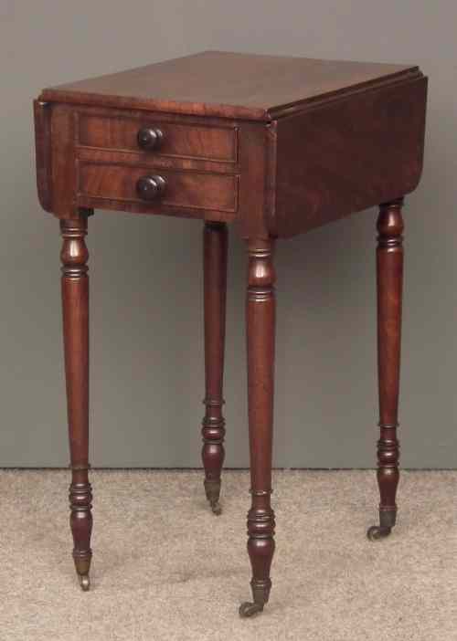 Appraisal: A late Georgian mahogany dropleaf work table fitted two real