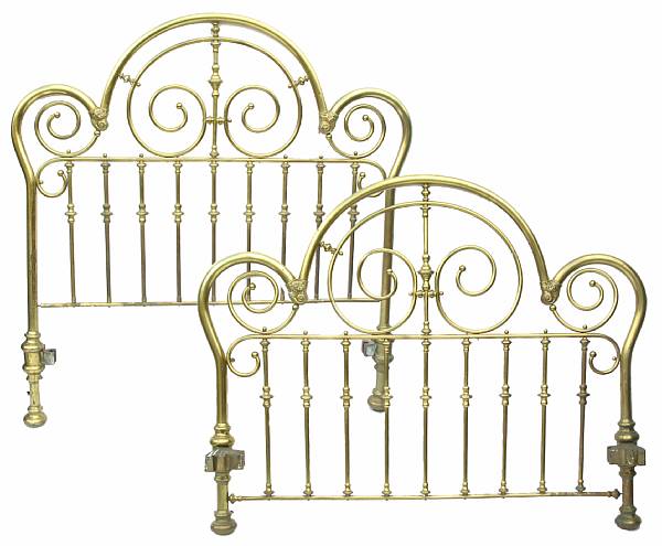 Appraisal: A Victorian brass bed together with a canopy duvet and