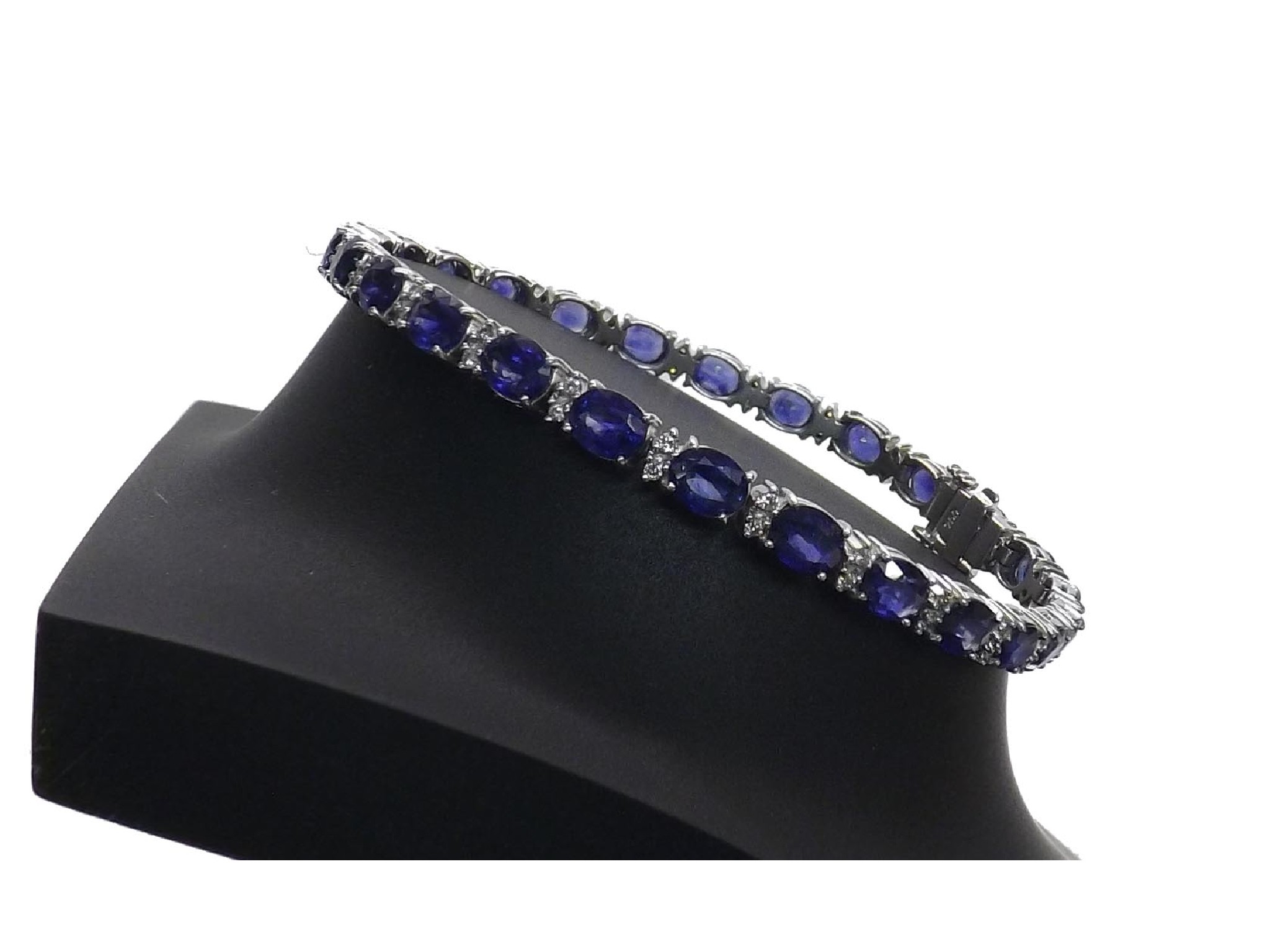 Appraisal: Good ct white gold sapphire and diamond line bracelet with