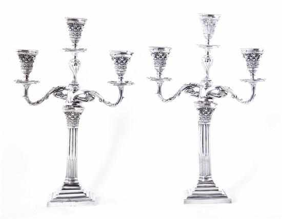 Appraisal: Pair Adam style silverplate three-light candelabra Corinthian column supporting scrolling