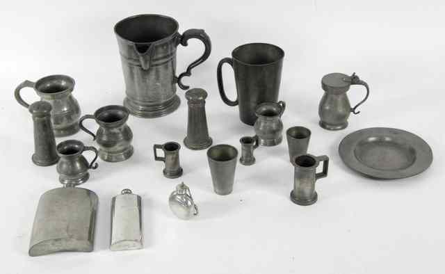 Appraisal: A pewter quart jug engraved beneath 'Palmerston Arms Grosvenor Park