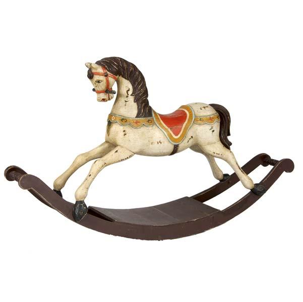 Appraisal: ROCKING HORSE With carved wood body attached to turned and