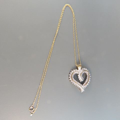 Appraisal: Diamond Heart Pendant round diamonds on chain all k yellow