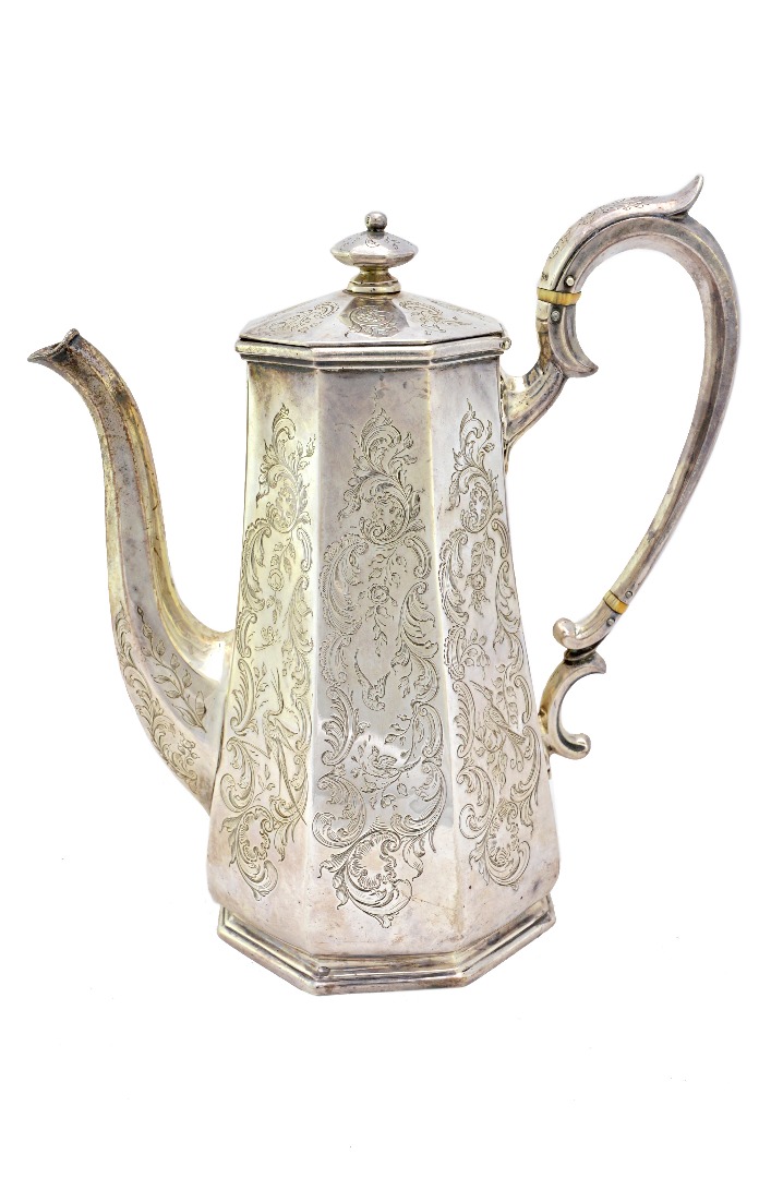 Appraisal: A Victorian silver coffee pot of tapering octagonal form with