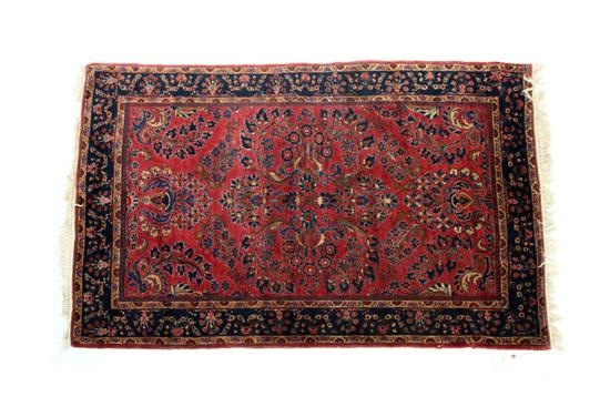 Appraisal: ORIENTAL RUG Ca s Sarouk Burgundy ground Patch and added