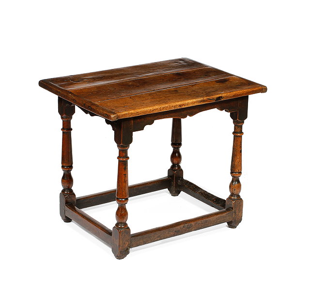 Appraisal: AN ANTIQUE OAK RECTANGULAR TOPPED OCCASIONAL TABLE the triple planked