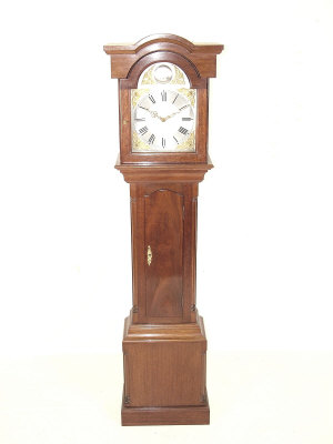 Appraisal: A mahogany longcase clock the arched hood with silvered dial