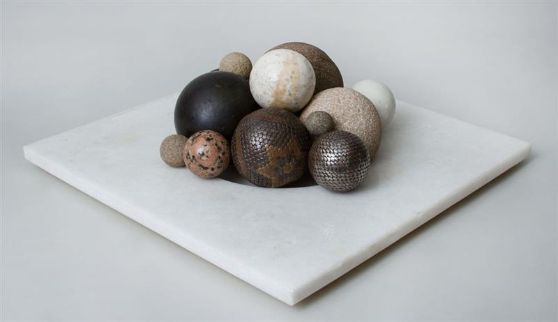 Appraisal: Collection of Spheres and Eggs on a Marble Stand Comprising