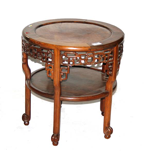 Appraisal: A Chinese hardwood two-tiered circular side table Late Qing Republic