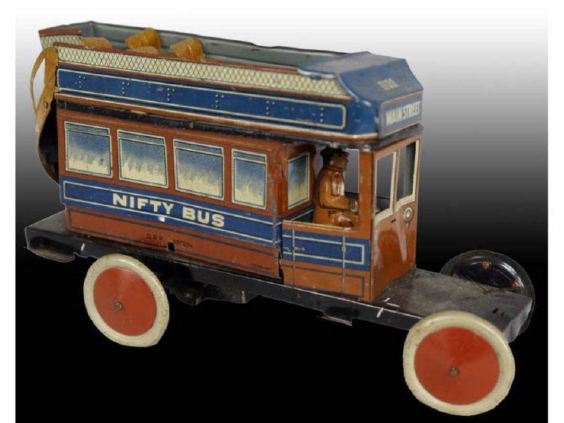 Appraisal: German Nifty Tin Wind-Up Bus Description Includes driver and back