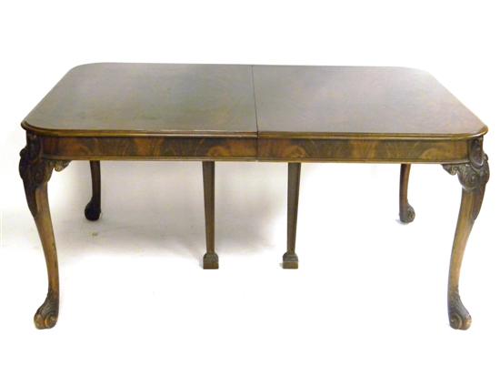 Appraisal: Georgian style dining room table oblong table with crotch veneer