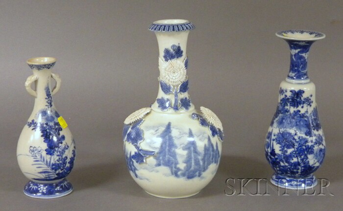 Appraisal: Three Japanese Blue and White Porcelain Vases two small floral-decorated