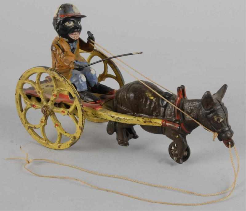 Appraisal: Cast Iron Donkey Cart Toy Description American Manufactured by J