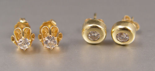 Appraisal: PAIR DIAMOND STUD EARRINGS K yellow gold earrings contain round