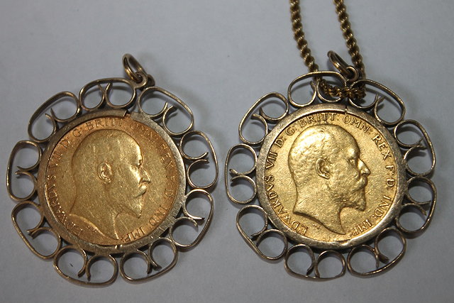 Appraisal: TWO HALF SOVEREIGNS and both mounted as pendants and one