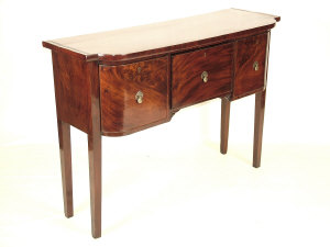 Appraisal: A George III style mahogany bowfront secretaire sideboard th century