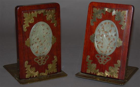 Appraisal: PAIR ORIENTAL BOOKENDS HAving carved jadite oval medallions