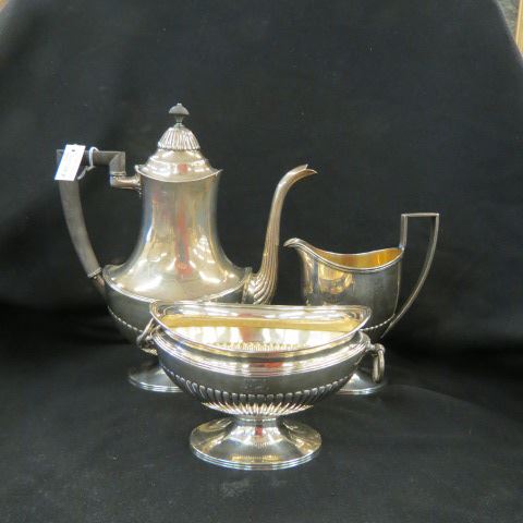 Appraisal: Tiffany Sterling Silver Tea Set classic pedestal ribbed design teapot