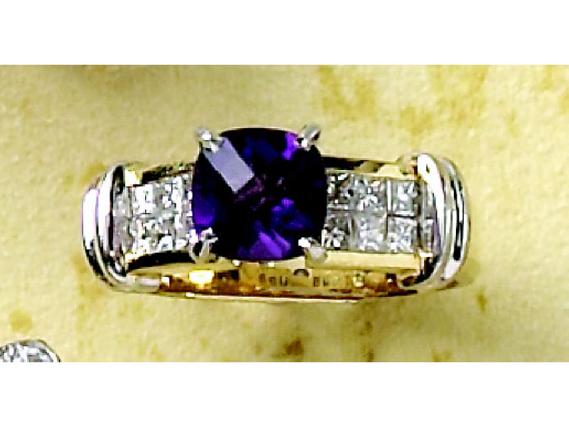 Appraisal: AMETHYST AND DIAMOND RING k yellow gold invisible set ring