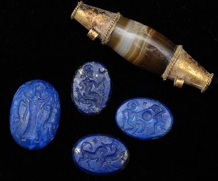 Appraisal: Four Lapis Intaglio Gems together with an Agate Bead with