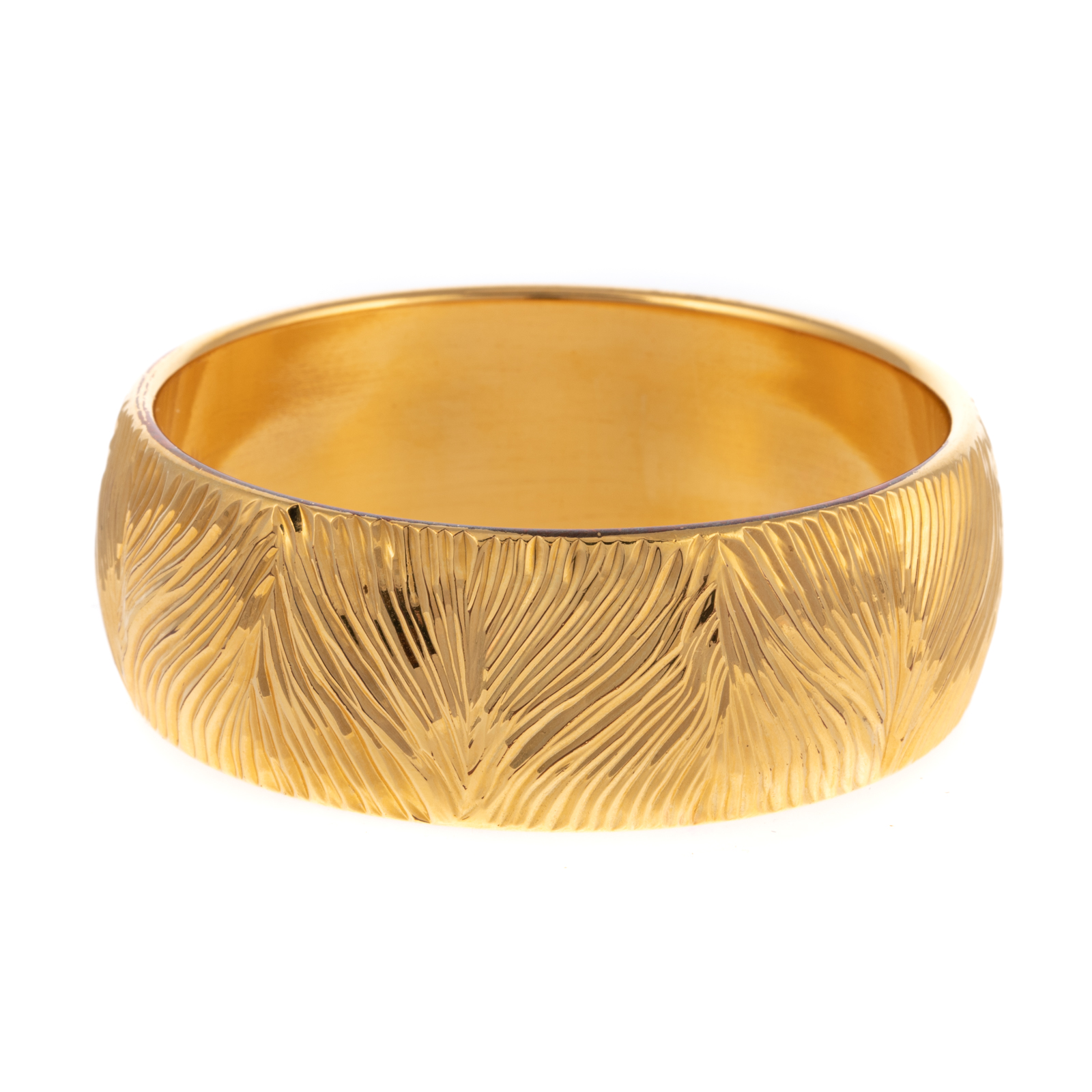 Appraisal: A WIDE ENGRAVED BANGLE BRACELET IN K K yellow gold