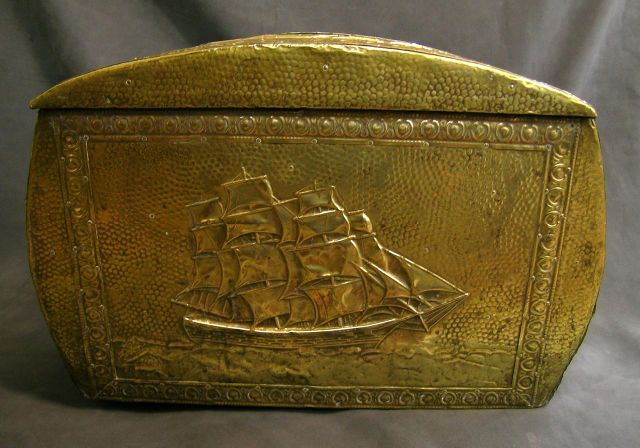 Appraisal: Vintage wood box clad in Tooled brass exterior with embossed