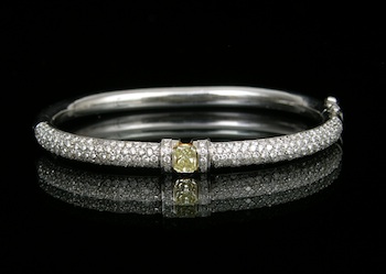 Appraisal: A Ladies' k Gold and Diamond Bangle Bracelet k white