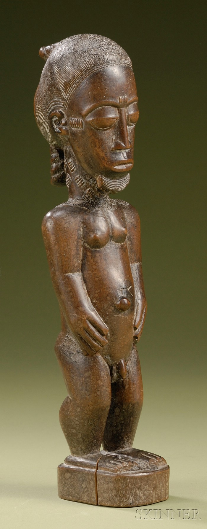 Appraisal: African Carved Wood Male Figure Baule with incised coiffure and