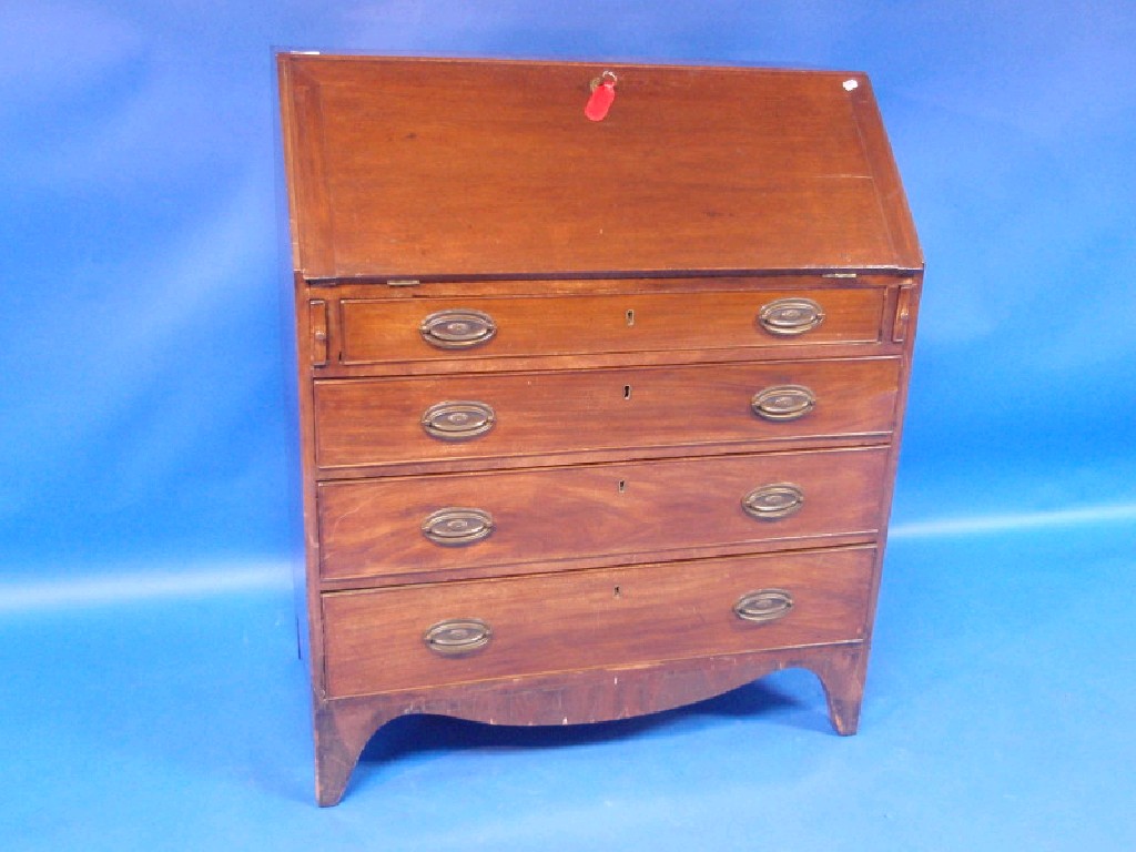 Appraisal: A Georgian mahogany bureau the fitted interior with series of