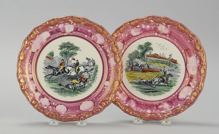 Appraisal: TWO SUNDERLAND PINK LUSTRE CIRCULAR PLAQUES Circa With steeplechase scenes