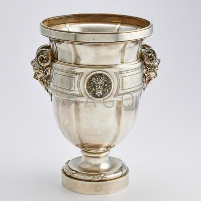 Appraisal: FRENCH SILVER WINE COOLER Strapped tulip form with figural satyr