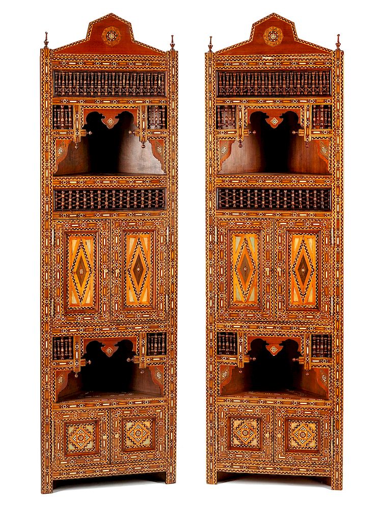 Appraisal: A Pair of Moorish Style Mother-of-Pearl Inlaid Corner Cabinets A