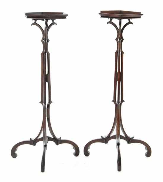 Appraisal: Pair George III style mahogany torcheres hexagonal dished top above