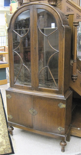 Appraisal: AN OAK CABINET BOOKCASE ON CABINET English mid- th century