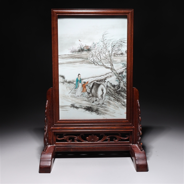 Appraisal: Flamed Chinese porcelain plaque in carved wood frame plaque with