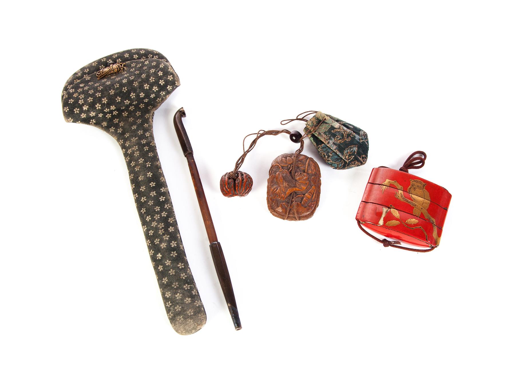 Appraisal: THREE JAPANESE ACCESSORIES INCLUDING INRO Late th- th century Cinnabar