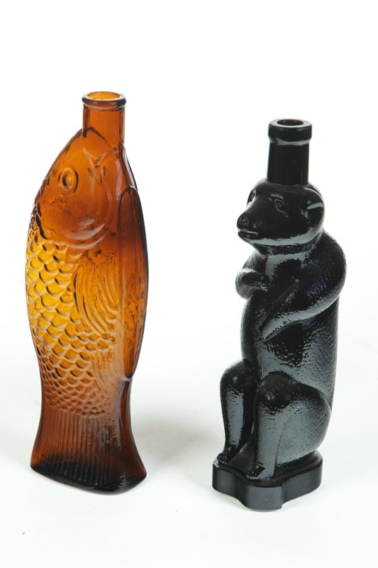 Appraisal: TWO BITTERS BOTTLES American nd half- th century Seated bear